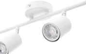 White ceiling light fixture with three circular lights on a white background