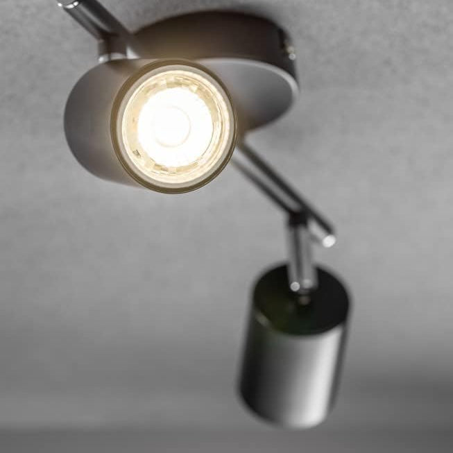 Modern ceiling light fixture with a gray finish on a neutral background