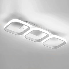 Modern ceiling light fixture with three rectangular panels on a gray background