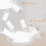 White ceiling light fixture with rotating rods on a neutral background