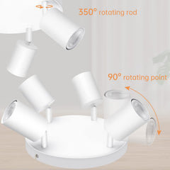 White ceiling light fixture with rotating rods on a neutral background