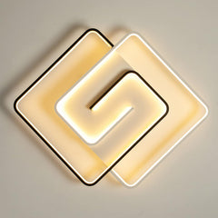 Modern ceiling light fixture with geometric design on a neutral background