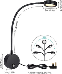 Black adjustable reading lamp with measurements on a white background