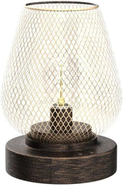 Table lamp with wooden base and mesh glass shade on a white background