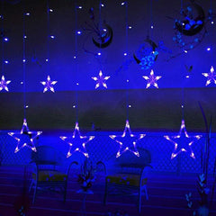 Star-shaped string lights hanging against a dark background