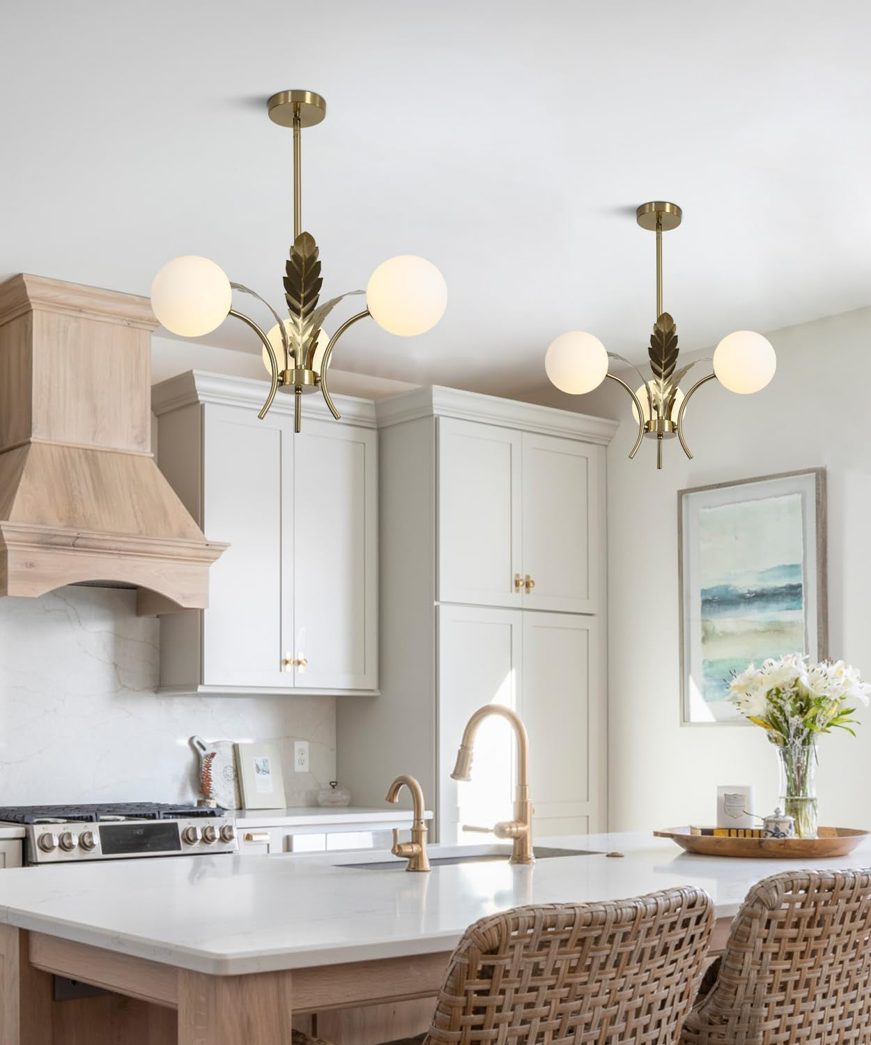 Modern kitchen with white countertops, wooden cabinets, and brass fixtures.