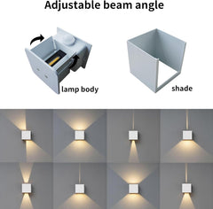 Light fixture with adjustable beam angle, showing lamp body and shade, and demonstrating light direction on a wall.