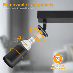 Black spotlight with removable lampshade and bulb installation illustration on a gray background