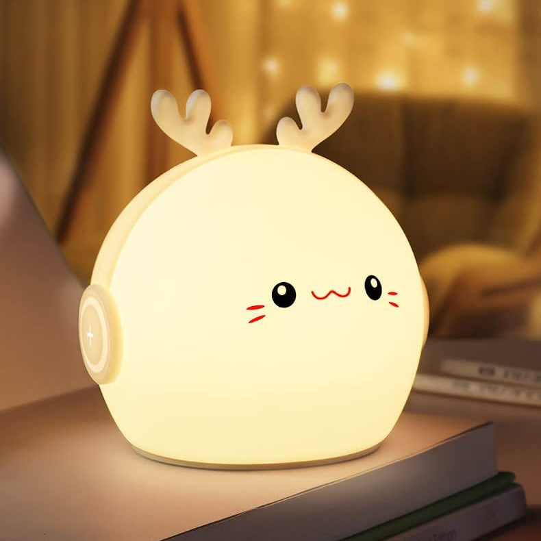 Deer-shaped night light with soft light eye protection feature on a blurred background