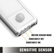 Close-up of a motion sensor with labeled modes on a white background