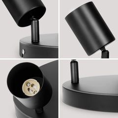 Black lamp with socket and bulb on a light gray background