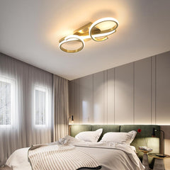 Modern bedroom with a ceiling light fixture