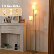 Floor lamp with E27 base bulbs displayed on a wall in a room setting.