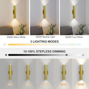 Gold wall sconce with adjustable lighting modes and dimming on a neutral background.