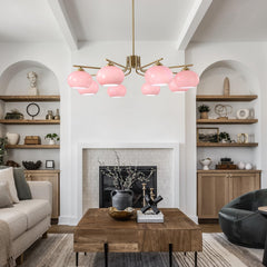 Modern living room with pink ceiling lights, wooden coffee table, and decorative shelves.