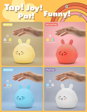 Four different colored rabbit-shaped night lights with taps on a colorful background.