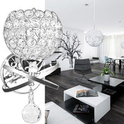 Heart-shaped crystal wall light fixture in a modern living room setting.