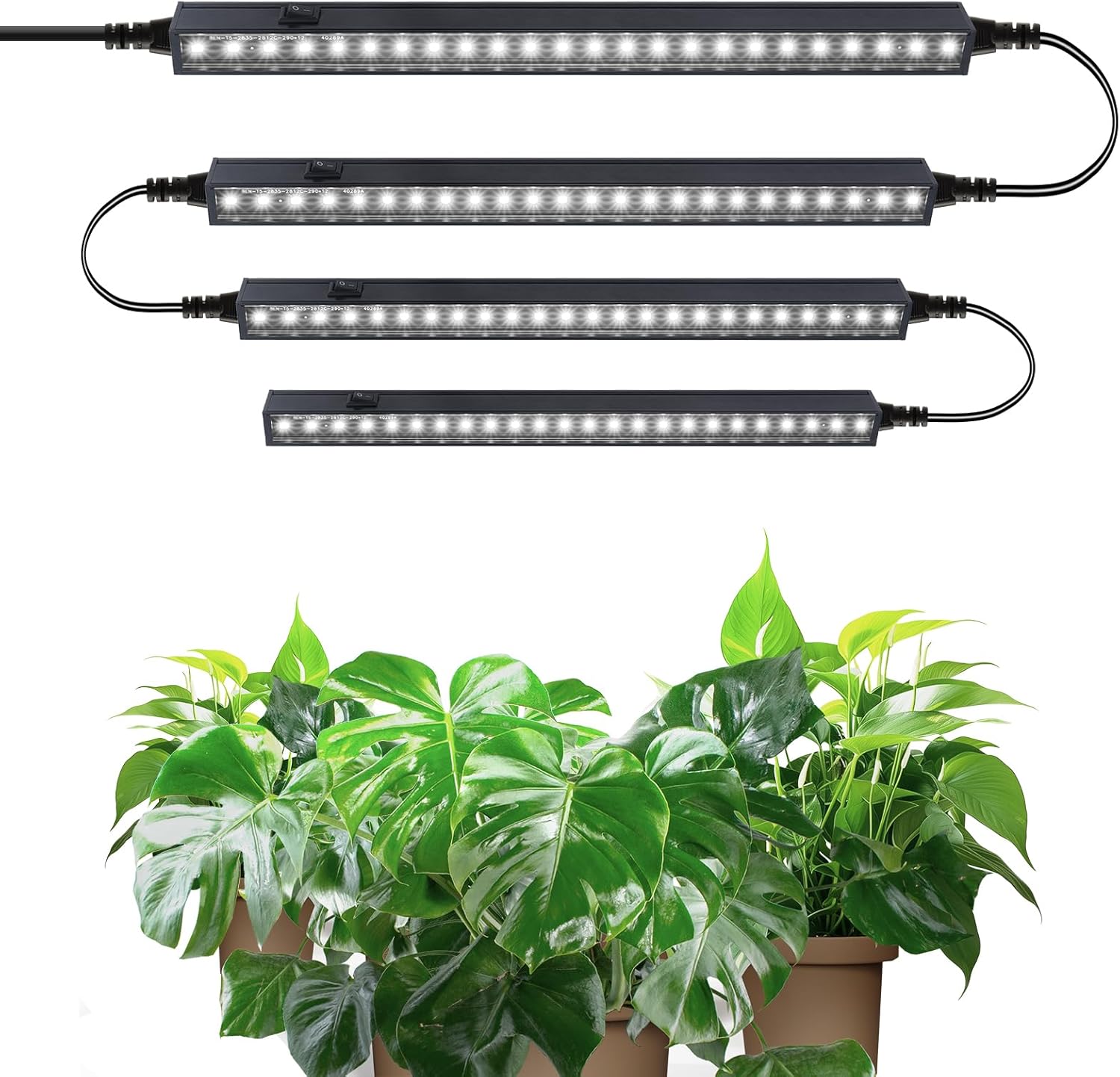 Set of LED grow lights above potted plants on a white background
