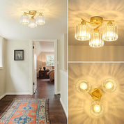 Gold ceiling light fixture with glass shades in a home interior setting.