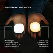 Two hands holding a white light and a warm light source with text explaining different light modes.