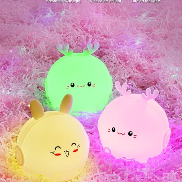 Colorful LED light-up toys with nine color options on a pink textured background