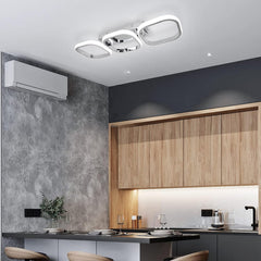 Modern kitchen with wooden cabinets, air conditioning unit, and ceiling lights.