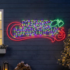 Merry Christmas Light Up Sign, Energy Efficient LED Outdoor Wall Decoration, Flashing Multi Coloured Rope Light Silhouette, Mains Operated (100cm)