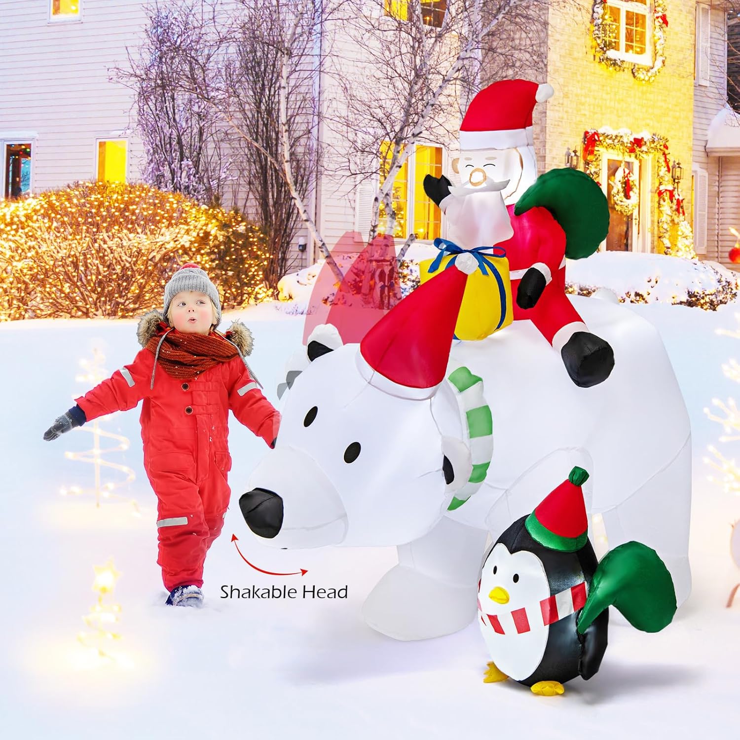 Inflatable Santa and penguin Christmas display