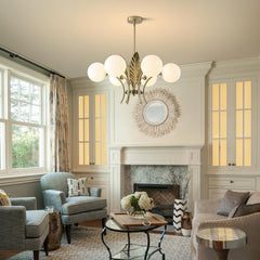 Living room with chandelier, fireplace, and decorative elements