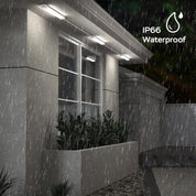 Outdoor setting with rain, building facade, and 'IP66 Waterproof' label.
