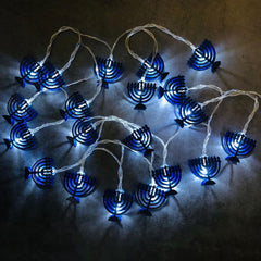 Illuminate your celebrations with these 1.65-meter (5.4-foot) battery-powered blue star string lights, featuring 10 LED stars, ideal for Chanukah, weddings, or bedroom decor.