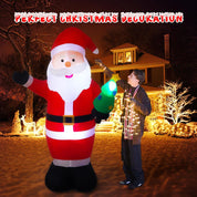 Holiday yard décor with inflatable Santa figure