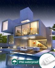 Modern house with a pool at night, featuring IP66 waterproof technology.