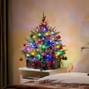 Artificial tabletop Christmas tree with colorful LED lights