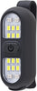 Black LED light with multiple small lights on a dark background