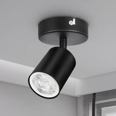 Black ceiling light fixture on a gray ceiling