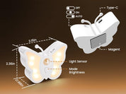 Butterfly-shaped light with features labeled on a brown background