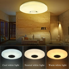 Ceiling light fixture in a room with different color temperature options displayed below.