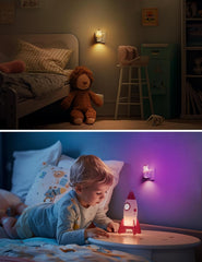 Child playing with a night light in a dimly lit bedroom
