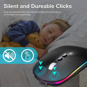 Child sleeping with a teddy bear and a wireless mouse with colorful lights on a dark background.