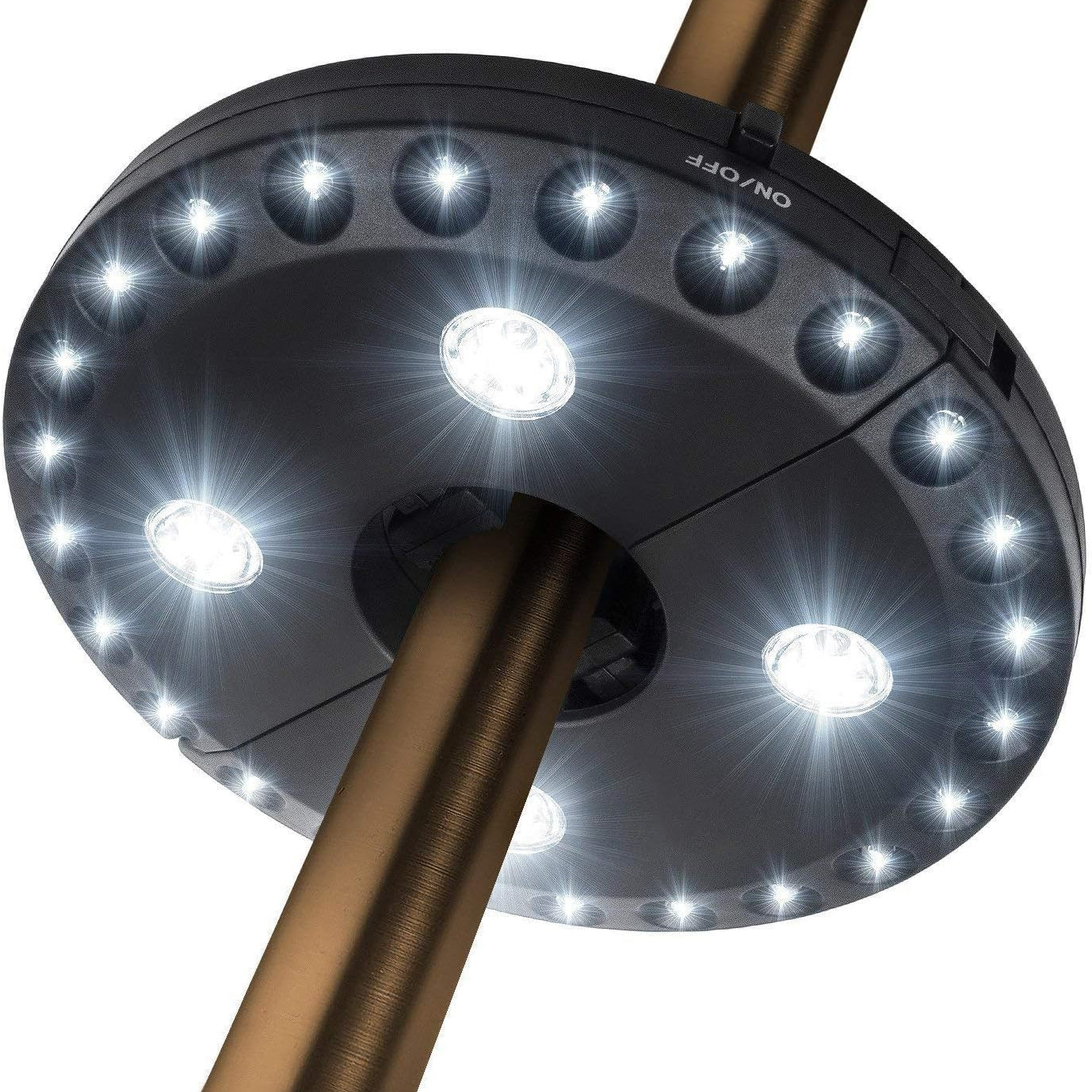 Close-up of a solar-powered LED light on a white background