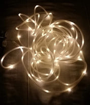 Coiled string of lights on a dark background