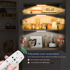 Cupboard with adjustable light control and remote, showcasing kitchen appliances.