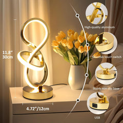 Decorative table lamp with USB connection on a surface with flowers, showing product features.