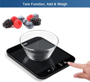 Digital kitchen scale with a glass of water on it, surrounded by berries, with text indicating tare function, add, and weigh features.