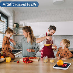 Family in a kitchen with a Vitafit branded product