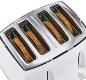 Four-slice toaster with bagels in the slots on a white background