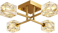 Gold ceiling light fixture with clear crystal shades on a white background