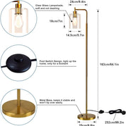 Gold floor lamp with clear glass shade, foot switch, and metal base, shown with measurements on a white background.