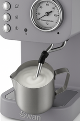 Gray Swan milk frother with a temperature gauge and milk pitcher on a white background